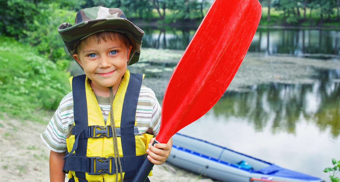 boy kayaking